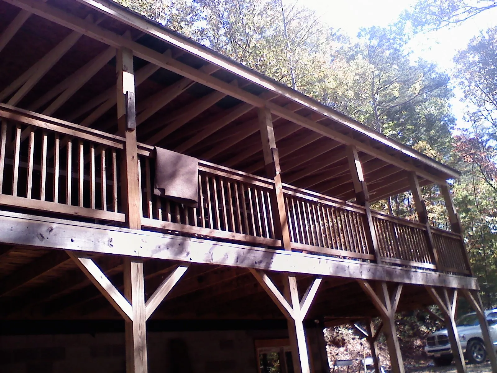 Timber framing under a new elevated porch and deck — Roof Leak Repair in Fruitland by Roofing Brothers